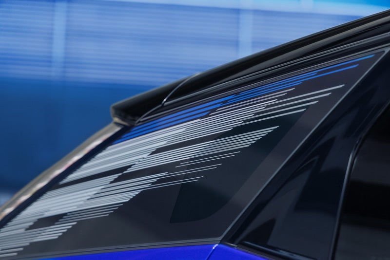 Close-up of the Modern Pattern on the 2026 OPTIQ-V Rear Quarter Glass | Jim Winter Cadillac in Jackson MI